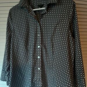 A Talbots large wrinkle resistant button-down navy w/white polka dot blouse.